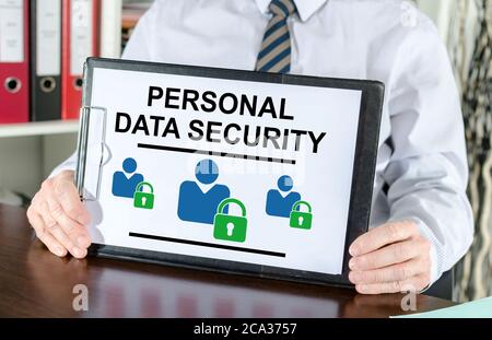 Personal data security concept shown by a businessman Stock Photo