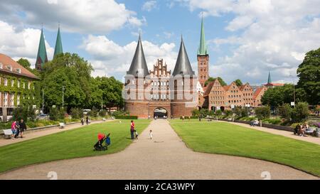 Holstentor (Holstein-Tor) - historical city gate. Landmark of the city of Lübeck. Stock Photo