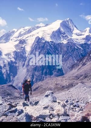 Switzerland, Arolla. These are the mountains of the Arolla Alps in Switzerland that are seen and crossed on the old hunters high mountain trade route between the French town of Chamonix and the Swiss town of Zermatt, with the Pigne d' Arolla mountain in the distance Stock Photo