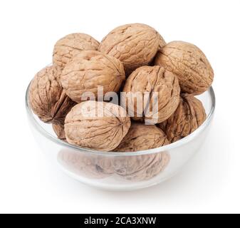 Walnuts in glass bowl isolated on white background with clipping path Stock Photo