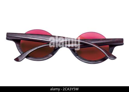 Sunglasses with wooden rim and round red glass rear view, isolated object on white background. Stock Photo