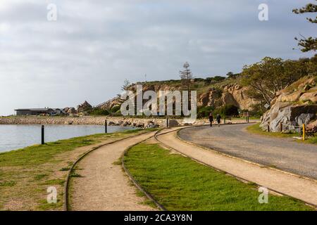 The iconic horse drawn cart and iconic rock formations on Granite Island Victor Harbor South Australia on August 3 2020 Stock Photo
