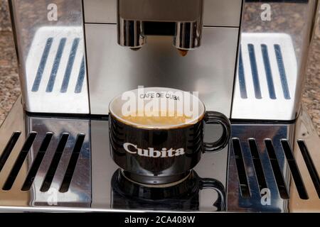 espresso home coffee making from DeLonghi Prima Donna Elite automatic bean to cup machine Stock Photo