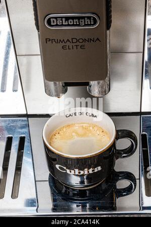 espresso home coffee making from DeLonghi Prima Donna Elite automatic bean to cup machine Stock Photo