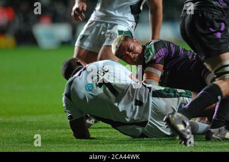 Heineken Cup Round 2 - Ospreys v London Irish @ The Liberty Stadium in Swansea. Ospreys Jerry Collins on the floor with London Irish's Chris Hala'ufia Stock Photo