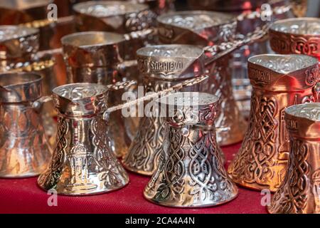 Traditional copper coffee pots cezve souvenirs from Sarajevo, BiH Stock Photo