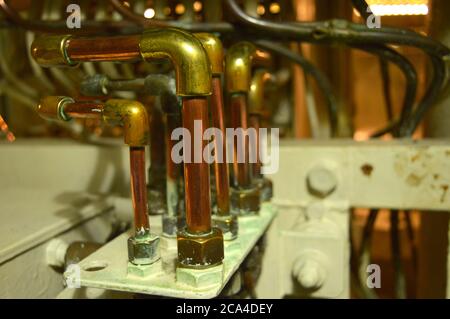 brass tubes used to monitor engine performance on ships Stock Photo