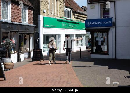 Sevenoaks, Kent,4th August 2020, People out and about in Sevenoaks, Kent. The forecast is for 20C sunny with a gentle breeze and is to get hotter as the week continues with temperatures expected of 32C or more on Friday. Credit: Keith Larby/Alamy Live News Stock Photo