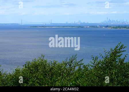 HIGHLANDS, NJ -16 JUL 2020- Day view of the Raritan Bay, Sandy Hook, and the New York City skyline seen from the Mount Mitchill Scenic Overlook in Hig Stock Photo