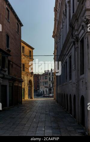 The light and shadows in the empty narrow alleys of Venice  during the coronavirus Stock Photo