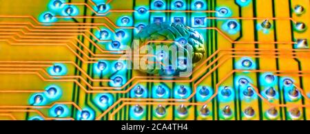 Close-up of brain and circuit board Stock Photo