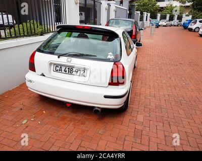 Small white car in Claremont Newlands, Cape Town, South Africa. Stock Photo