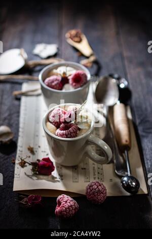 Cappuccino in cups with fruit.Morning coffee.Fresh drink.Healthy food and snack. Stock Photo
