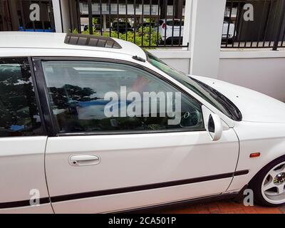 Small white car in Claremont Newlands, Cape Town, South Africa. Stock Photo