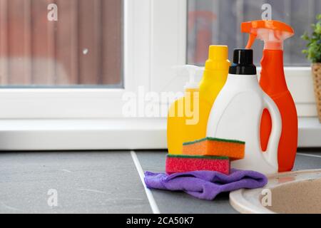 https://l450v.alamy.com/450v/2ca50k7/cleaning-detergents-and-tools-on-a-kitchen-counter-2ca50k7.jpg