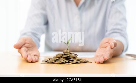 Tax concept. Man demonstrating scheme with icons Stock Photo - Alamy