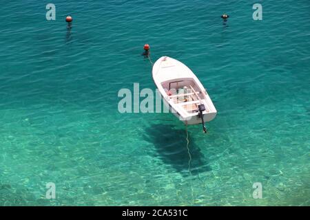 Brela, Croatia. Adriatic Sea nature. Podrace beach levitating boat. Stock Photo