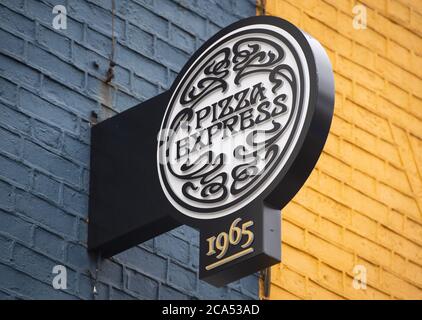 General view of a Pizza Express restaurant sign at a branch in