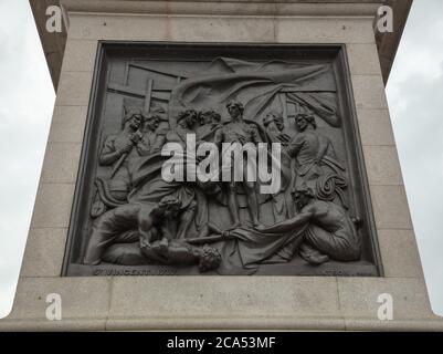 Close-up of Bas Relief of Admiral Horatio Nelson's battle of St Vincent, seen at the base of Nelsons Column on Trafalgar Square London. Stock Photo