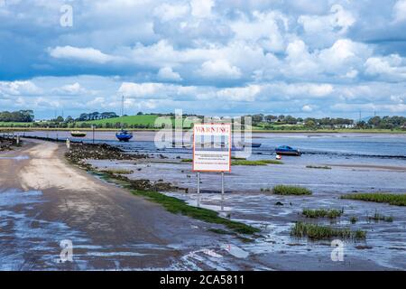 Causeway Road at Sunderland Point, is a small village among the marshes, on a windswept peninsula between the mouth of the River Lune and Morecambe Ba Stock Photo