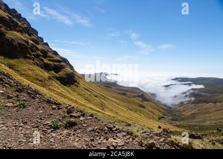 Over the clouds on Sani Pass from Lesotho to South Africa, Stock Photo