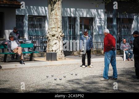 France, Haute Garonne, Toulouse, petanque players on a small square Stock Photo