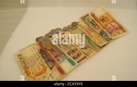 Brazilian banknotes and coins, Brazilian paper banknotes, placed side by side, comparative, side view, white background, money out of circulation Stock Photo