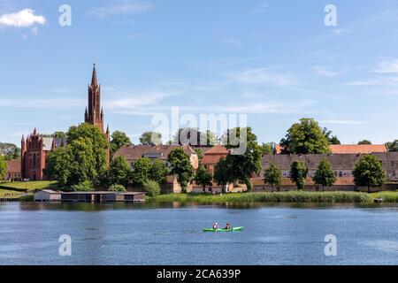 Malchow Abbey at Lake Malchow in the Mecklenburg Lake District, Germany Stock Photo