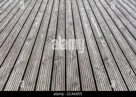 wooden planks of a jetty at lake for background use Stock Photo