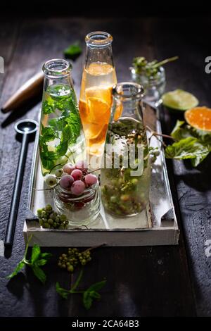 Fruit bottled water.Fresh drink.Fit juice.Delicious food and sweets. Stock Photo