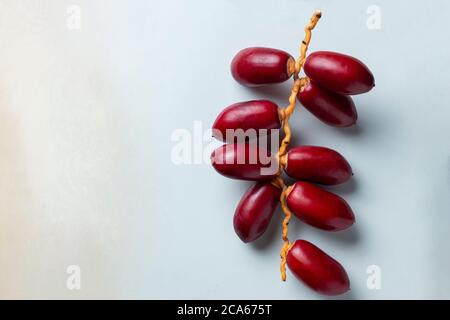 red dates fruit on white background Stock Photo