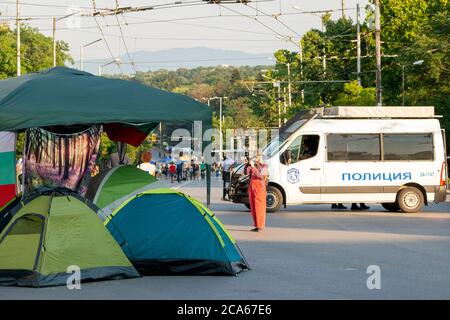 Sofia, Bulgaria. 3rd August 2020. Tents are seen at a major intersection in the streets of Sofia Bulgaria as the anti-Government peaceful protests against corruption intensify across the country for the last 26 days with some major streets and intersections around the parliament building blocked by tents and barricades and the capital city centre is totally closed for transport. Stock Photo