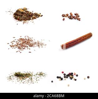 Various dried spices isolated against a white background. Arrabiata, caraway seeds, basil, a stick of cinnamon, pepper, Sichuan pepper, colored pepper Stock Photo