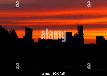 Sunrise over Leeds City Centre. The tall building to the right is Altus House and is now the tallest building in Yorkshire Stock Photo