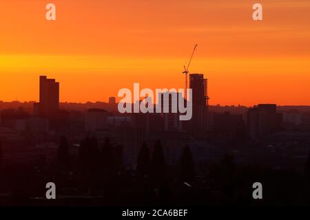 Sunrise over Leeds City Centre. The tall building to the right is Altus House and is now the tallest building in Yorkshire Stock Photo