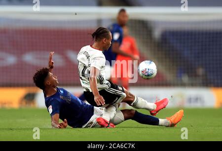 Brentford's Ollie Watkins tackles Fulham’s Bobby Decordova-Reid during the Sky Bet Championship Play Off Final at Wembley Stadium, London. Stock Photo