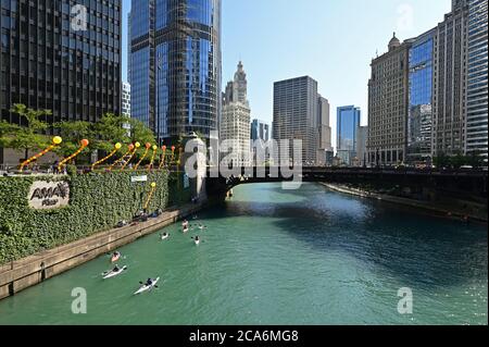Chicago, Illinois - August 8, 2019 - View of Chicago River, its bridges and surrounding buildings on a clear sunny summer day.
