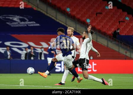 London, UK. 04th Aug, 2020. Ollie Watkins of Brentford (L) takes a shot at goal. EFL Skybet Championship play off Final, Brentford v Fulham at Wembley Stadium in London on Tuesday 4th August 2020. this image may only be used for Editorial purposes. Editorial use only, license required for commercial use. No use in betting, games or a single club/league/player publications. pic by Steffan Bowen/Andrew Orchard sports photography/Alamy Live news Credit: Andrew Orchard sports photography/Alamy Live News Stock Photo