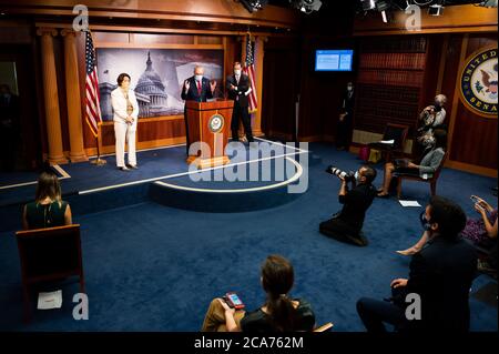 Senator Chuck Schumer (D-NY) while wearing a facemask speaks at the Democratic Senate weekly press conference. Stock Photo