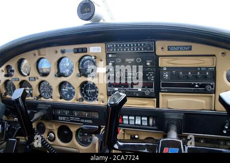 interior displays and controls in the cockpit of an old plane on the instrument panel Stock Photo