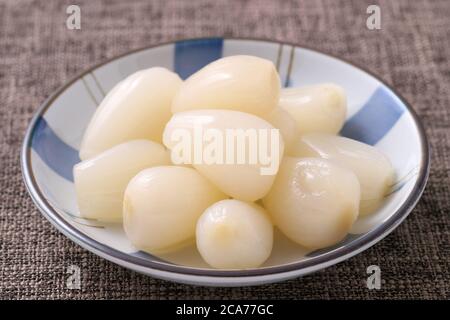 Rakkyo, Pickled Japanese leek, Pickled scallions in a dish Stock Photo