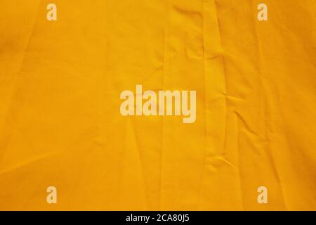 Waterresistant fabric close up of umbrella canopy surface with folding wrinkles Stock Photo