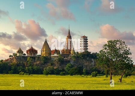 Tiger Cave Temple (Wat Tham Seua) Thai and Chinese temples during twilight time in Kanchanaburi province. Stock Photo