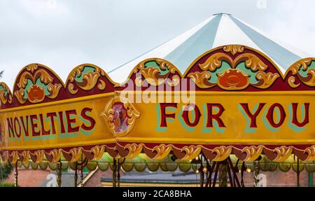 'Novelties for You': a merry-go-round at Ropley Station on the Mid-Hants Steam Railway (the Watercress Line), Hampshire, England, UK Stock Photo