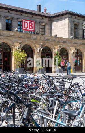 Erlangen, Germany. 29th July, 2020. View of the entrance facade of the main station with bicycles in the foreground. Credit: Stephan Schulz/dpa-Zentralbild/ZB/dpa/Alamy Live News Stock Photo