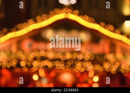 Illumination of Christmas market in Germany, Europe. Defocused Christmas bokeh lights decoration Stock Photo