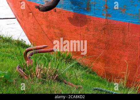 Rusty Pirate rusty and old big pirate ship anchor laying on the ground, sailor ...