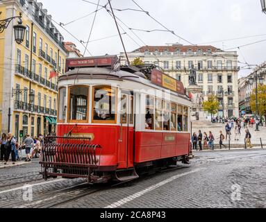 Historic Tram passing through Camões Square, Lisbon Stock Photo