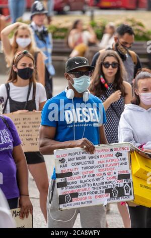 Protesters listening to a speech during a Black Lives Matter demonstration, Marble Arch, London, 2 August 2020 Stock Photo