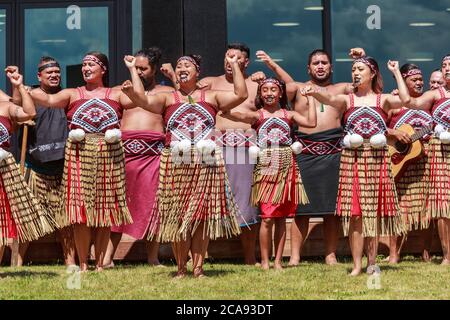 Maori women of a kapa haka (traditional dance) group performing. Mount
